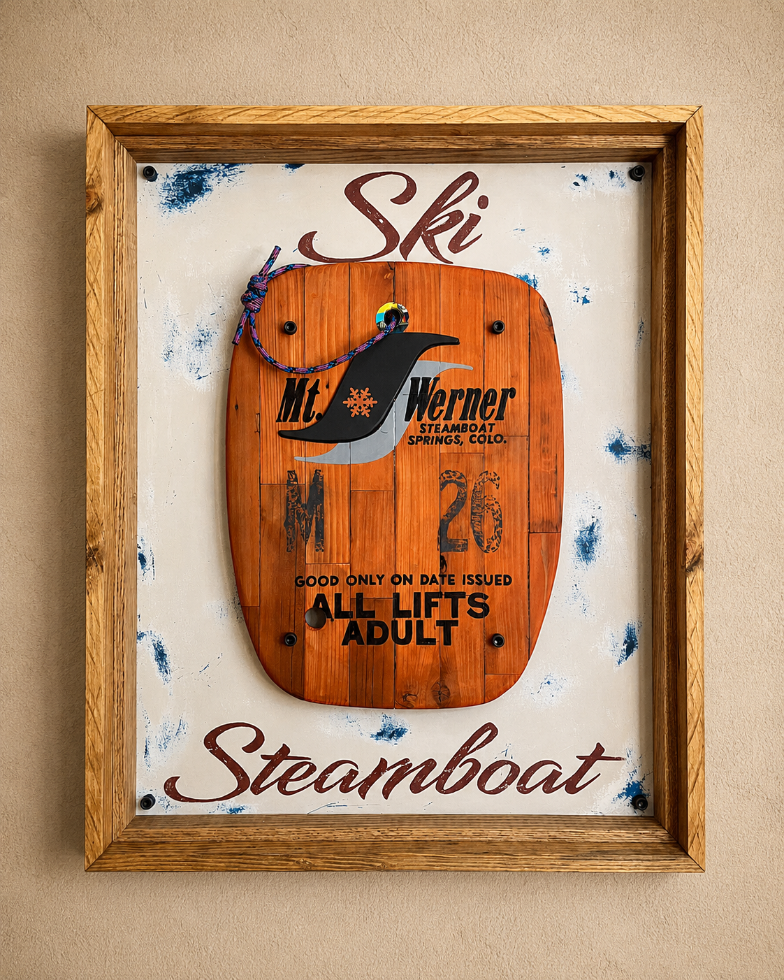 Original mixed media ski artwork titled Stamped In Time featuring a handcrafted vintage Mt. Werner lift ticket made from reclaimed wood, beetle-kill pine, and layered Colorado-inspired materials.